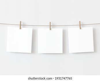 Set Of Three Note Paper Cards Hanging With Wooden Clip Or Clothespin On Rope String Peg Isolated On White Backgroun. 3D Illustration