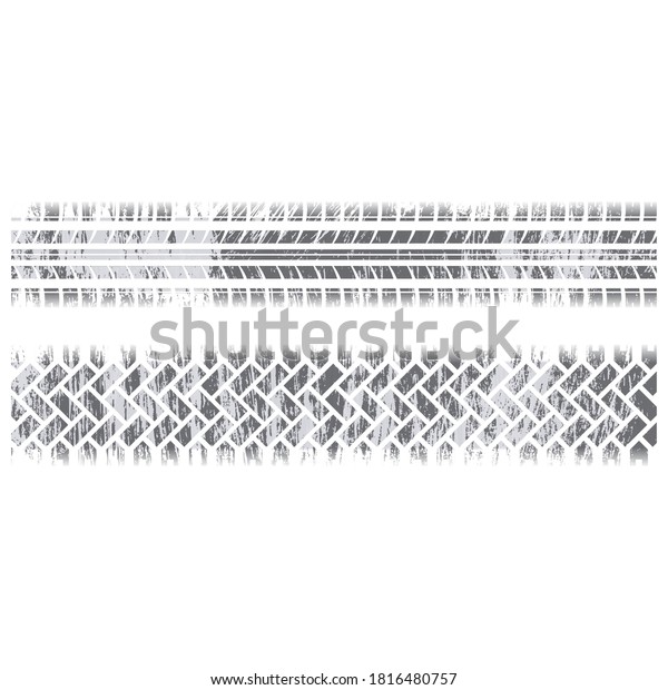 Set of two tire track silhouettes isolated on\
white background