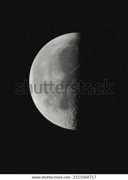 Setting quarter moon, black and white image,
illustration 