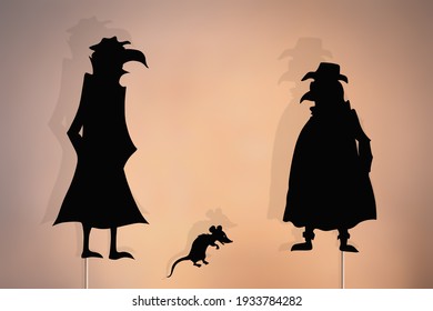 Shadow Puppets Of Two Plague Doctors And A Rat 