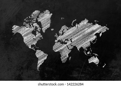 the shape of the world map drawn on a blackboard