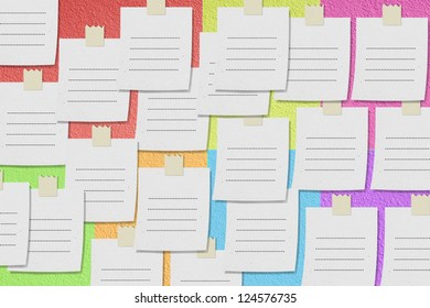 sheet of paper for notes and stuck tape on the color wall