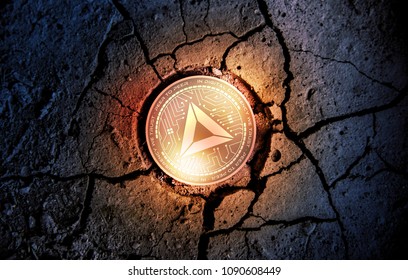 shiny golden BASIC ATTENTION TOKEN cryptocurrency coin on dry earth dessert background mining