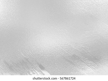 Shiny Silver foil decor, white grey metallic background.