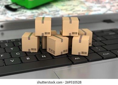Shipping, delivery and logistics technology business industrial concept: macro view of heap of stacked corrugated cardboard package boxes on computer PC laptop notebook keyboard with selective focus - Shutterstock ID 269510528