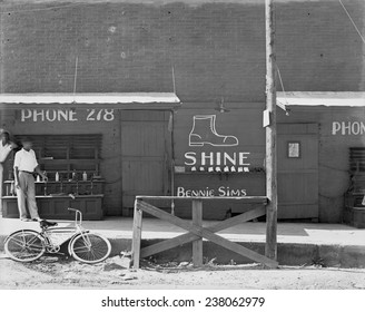 Shoeshine Stand, Southeastern U.S., By Walker Evans, 1936.