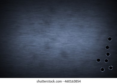 Shotgun Bullet Hole On Blue Metal Plate. Metal Background.