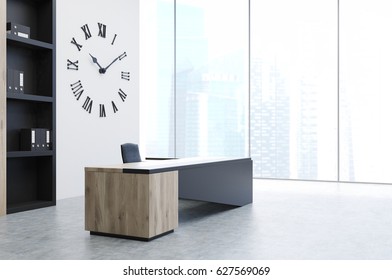 Side View Of A CEO Office Interior With A Modern Black Desk, A Bookcase And A Giant Clock Hanging On A White Wall. 3d Rendering.