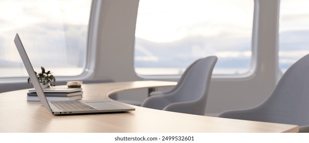 A side view of a laptop computer on a wooden curved table in a minimalist bright office. place of work, office, workspace, 3d render, 3d illustration