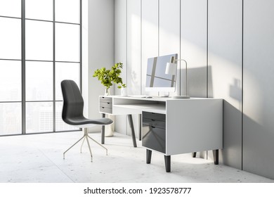 Side View On Modern Home Office Table With Computer, Chair, Light Interior And Big Window. 3D Rendering