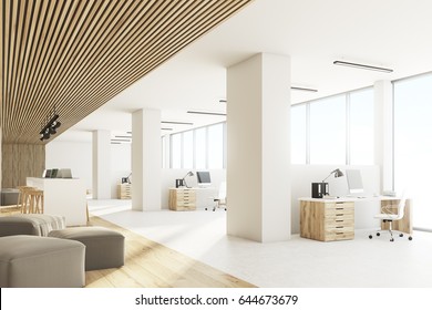 Side view of an open office interior with a bar table, laptops standing on it, light wooden ceiling and floor and a wall with sticky notes. 3d rendering