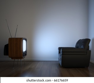 Side View Of Retro TV And Black Couch In An Empty White Room Illuminated By The Screen With Copy Space