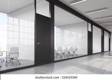 Side View Of A Row Of Meeting Rooms In A Long Corridor. Glass Walls, Black Doors. Concept Of Communication. 3d Rendering.