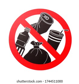 Sign of do not leave garbage or litter.  Black silhouette of can, cup, bottle and rubbish bag with red circular cross. White background. 