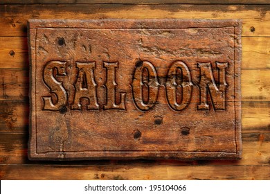 Signboard Of Saloon On A Wooden Wall