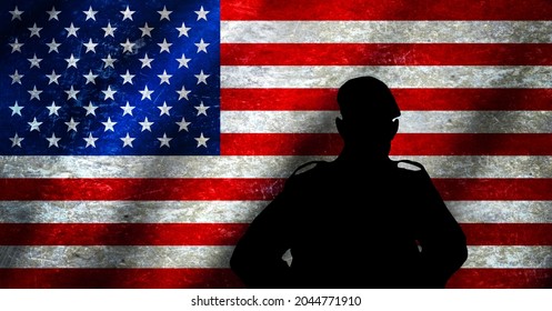 Silhouette Of An American Soldier In Military Beret Facing Grunge Style USA National Flag. Concept: United States Army, Veterans Day, Memorial Day, Armed Forces Day, Other US Military Services