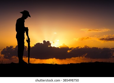 Silhouette Of Australian ANZAC Soldiers Against The Sky.