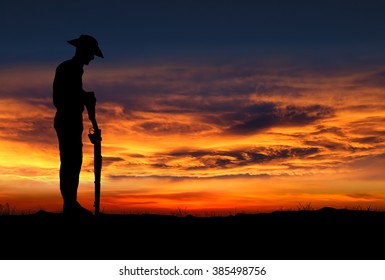 Silhouette Of Australian ANZAC Soldiers Against The Sky.