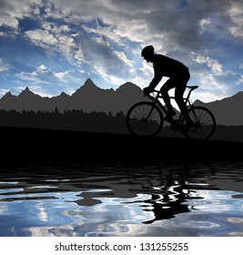 silhouette of the cyclist riding a road bike at sunset - Powered by Shutterstock