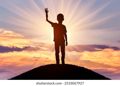 Silhouette of a disabled boy with a prosthetic arm, standing on a hill and waving as the sun sets behind him. Ideal for themes of inspiration, growth, and overcoming challenges - Powered by Shutterstock