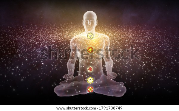 Silhouette in an\
enlightened Yoga meditation pose with the Hindu Chakras overlapping\
a galaxy of\
stars.