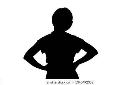 Silhouette Female Construction Worker With Hands On Hips Looking At Something.