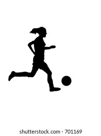 Silhouette Of A Female Soccer Player Dribbling