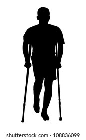 A silhouette of a full length portrait of an injured man on crutches isolated against white background