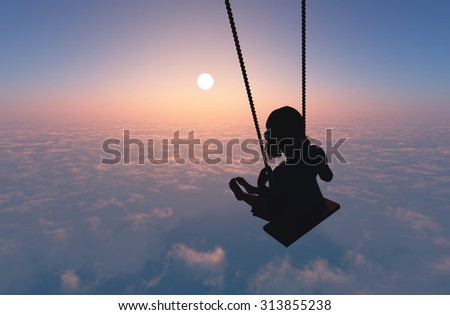 Silhouette of a girl on a swing on clouds.