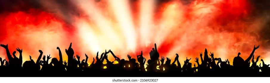 silhouette of guys - crowd - at the concert - Powered by Shutterstock