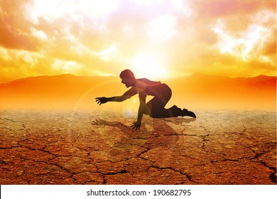 Silhouette Of A Man Crawling On Arid Land