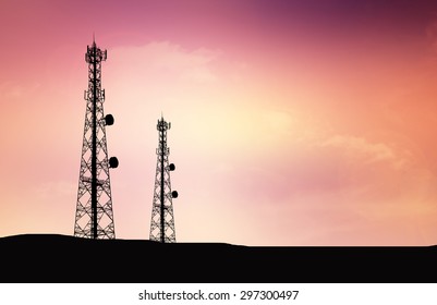 Silhouette phone antenna.Sunset background
