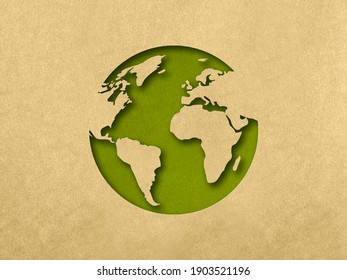 The silhouette of the planet in the style of paper clippings. Ecological concept. Green planet. Earth Day. Mother Nature. Recycling. Biodegradable material.