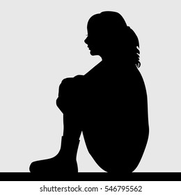 Silhouette Of Sad Young Woman