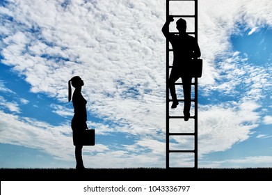 Silhouette of workers, a man climbs the career ladder instead of a woman. The concept of gender inequality and discrimination against women in their careers