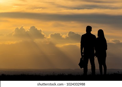 Silhouette young couple on sunset time. - Powered by Shutterstock