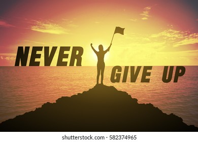 Silhouette young woman standing and raising up her hand and flag about winner concept on NEVER GIVE UP text over a beautiful sunset or sunrise at the sea. background for happy. success in 2017 - Powered by Shutterstock