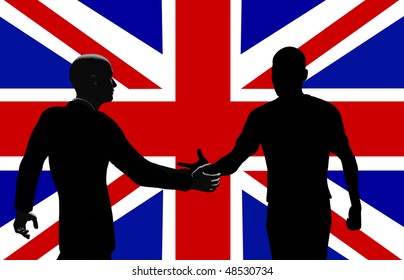 Silhouetted men shaking hands .
