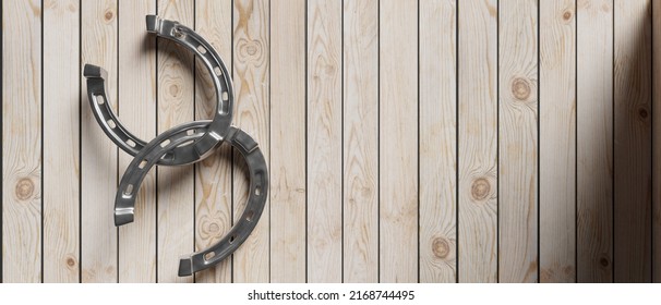 Silver Horseshoe On Wooden Plank Empty Background. Nailed And Hanged Two Shiny Horse Shoe With Hole, Talisman, Fortune. Copy Space, Banner. 3d Illustration