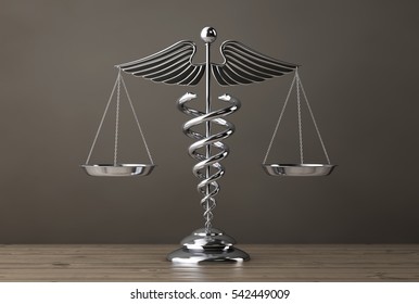 Silver Medical Caduceus Symbol as Scales on a wooden table. 3d Rendering