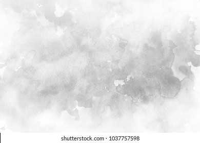 Silver watercolor ombre leaks and splashes texture on white watercolor paper background. Natural organic shapes and design.