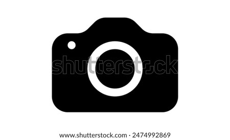 A simple black and white icon of a camera with a circular lens in the center.
