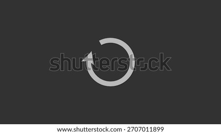 A simple, light gray circular arrow icon with an arrowhead, set against a dark gray, solid background. Represents loading or refresh.