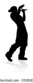 A Singer Pop, Country Music, Rock Star Or Hiphop Rapper Artist Vocalist Singing In Silhouette