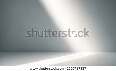 Single beam of light illuminating a grey floor and wall in a minimal setting. Realistic photos for product photo mockups, Digital advertising of any product.