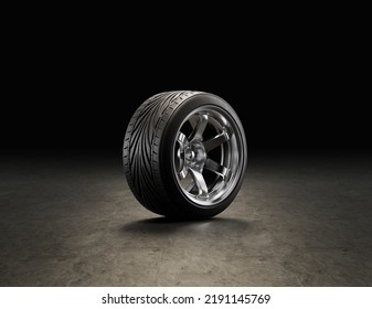 Single Car Tire On A Garage Floor. Rubber Tire With Shiny Chrome Rim From Side View. 3d Rendering, Nobody