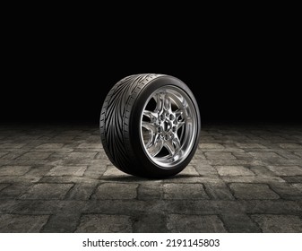 Single Car Tire On A Garage Floor. Rubber Tire With Shiny Chrome Rim From Side View. 3d Rendering, Nobody