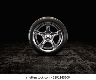 Single Car Tire On A Garage Floor Rubber Wheel With Shiny Chrome Rim. 3d Rendering, Nobody, Front View