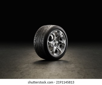 Single Car Tire On A Garage Floor. Rubber Tire With Shiny Chrome Rim From Side View. 3d Rendering, Nobody