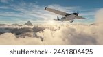 Single Engine Airplane flying over dramatic mountain landscape at sunset. 3d Rendering.